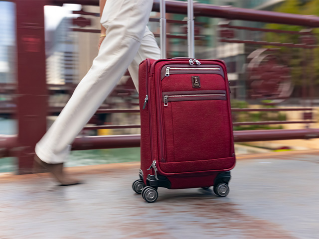 Travelpro, VersaPack+ Medium Check-in Expandable Spinner | Zola